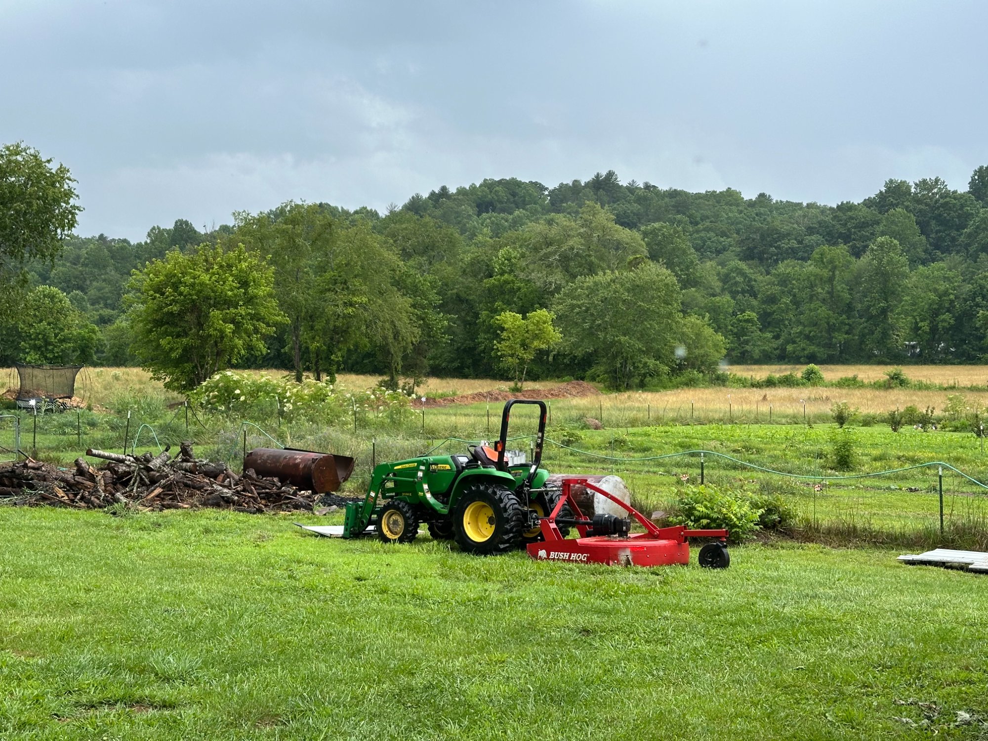 Tractor working the land at Sharp Iron Farmstead